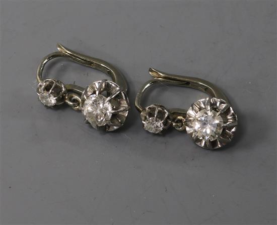 A pair of mid 20th century French 18ct white gold and diamond set drop earrings, 22mm.